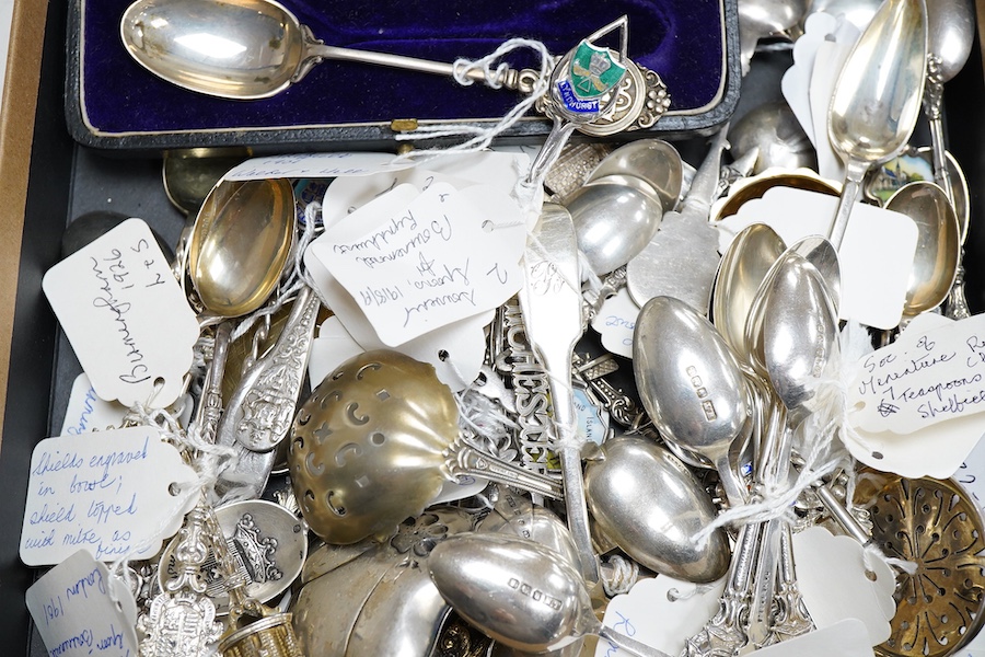 A large collection of assorted mainly 20th century silver and white metal commemorative and club spoons, some enamelled, including a set of six ' Society Miniature Rifle Clubs' teaspoons, by Walter Trickett, Sheffield, 1